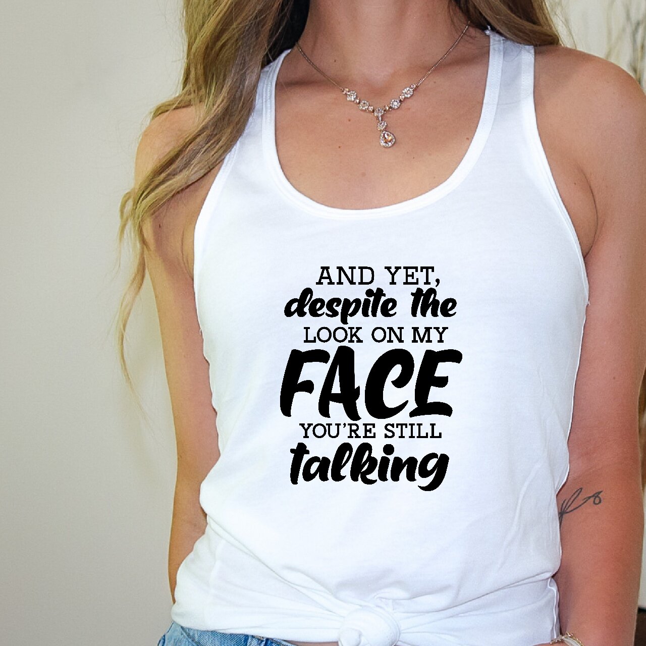 And Yet, Despite The Look On My Face You're Still Talking - Tank Top